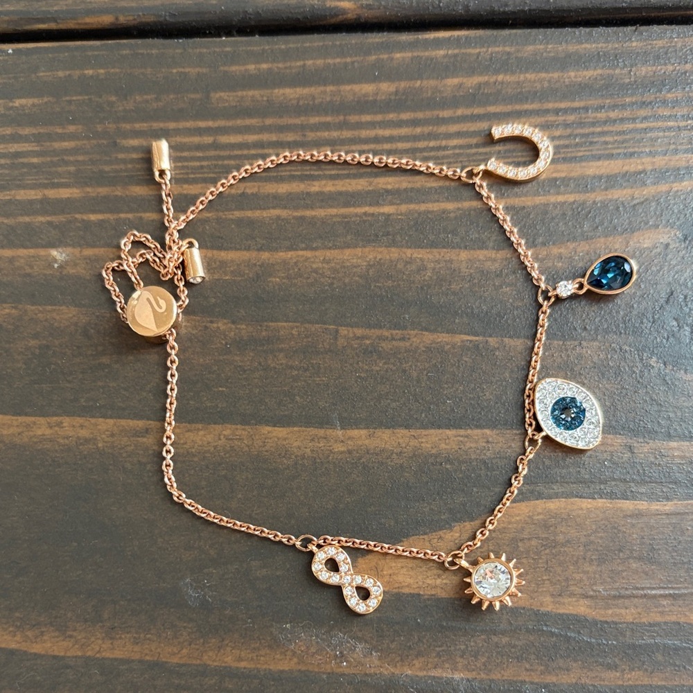 Swarovski Rose Gold Charm Bracelet with Blue Accents